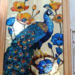 Praca Pacjenta - na obrazie ukazano błękitnego pawia