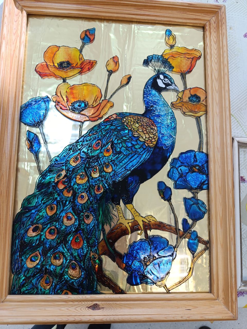 Praca Pacjenta - na obrazie ukazano błękitnego pawia